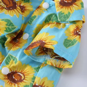 Detailansicht eines Sonnenblumen-Hundeshirts mit Druckknöpfen und hochwertigen Nähten.