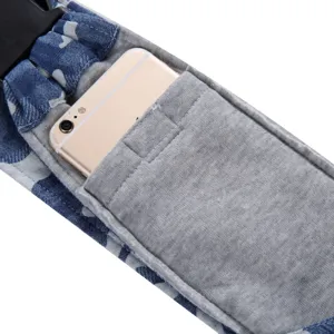 Pet carrier bag detail shot showing phone pocket and breathable denim strap design for travel.