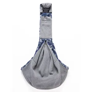 Comfortable sling pet carrier bag with blue camouflage exterior and grey interior for small dogs.