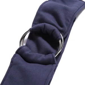 Breathable pet sling bag detail showing durable metal adjustment rings and soft navy fabric.