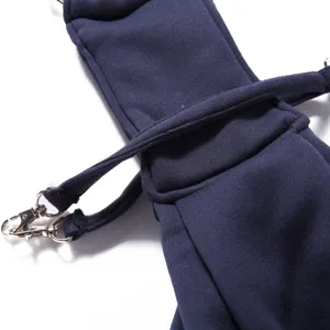 Breathable pet backpack strap detail, durable adjustable single shoulder dog carrier accessory.