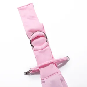 Pink single shoulder pet sling carrier detail view, breathable fabric for small dogs and cats.