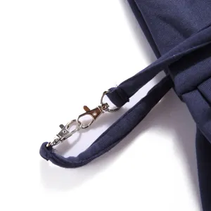 Pet backpack shoulder strap detail view, durable metal hardware and breathable fabric material.