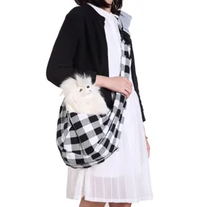 Black and white checkered pet sling bag detail, breathable puppy carrier pouch for outdoor.