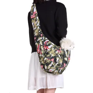 Detailed view of camo pet sling carrier with US flag pattern, perfect for small dogs outside.