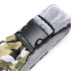 Close-up detail showing the durable plastic buckle and camouflage strap of breathable pet sling bag.