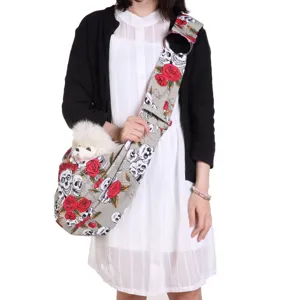 Breathable skull print pet sling bag, comfortable cross-body carrier for small dogs and cats.