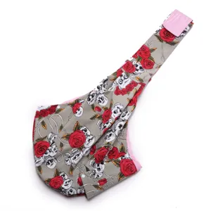 Skull rose print pet sling bag, breathable crossbody carrier for small dogs and cats.