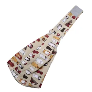 Cute dog pattern pet sling carrier bag detail view showing comfortable strap design.