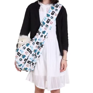 Detailed close-up view of the breathable crossbody pet sling bag featuring cute cat patterns.