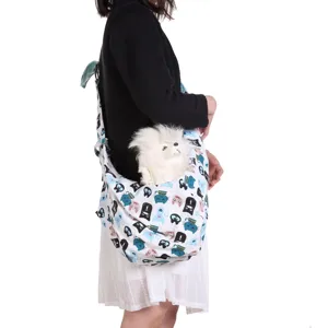 Detail view of breathable pet sling bag worn by model, perfect for carrying small dogs safely.