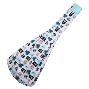 Breathable pet sling carrier bag for cats and small dogs, cute cat print design detail.