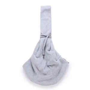 Close-up detail of grey cotton pet sling bag, soft fabric shoulder strap with metal safety clasp.