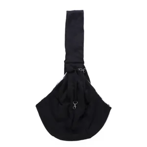 Detailed view of black breathable pet sling bag, showing adjustable strap and metal hardware.