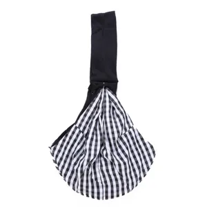 Black and white gingham pet sling bag detail, breathable fabric, comfortable shoulder strap.