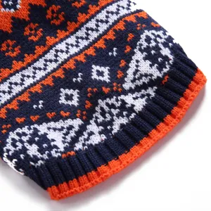 Close-up detail of retro knit pet sweater with classic geometric pattern and warm ribbed hem.
