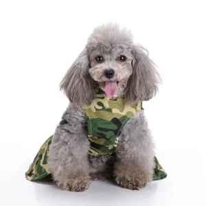 Detail view of a camouflage patterned summer pet dress worn by a grey toy poodle
