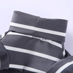 Grey white striped pet turtleneck sweater detailed view, cozy dog pajamas apparel for small dogs.