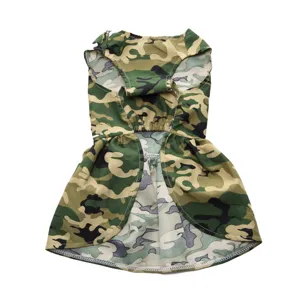 Close-up detail of the classic green camouflage pattern on a pet summer dress for dogs.