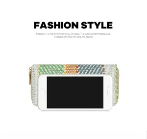 Stylish woven plaid linen clutch wallet shown with a smartphone for scale comparison