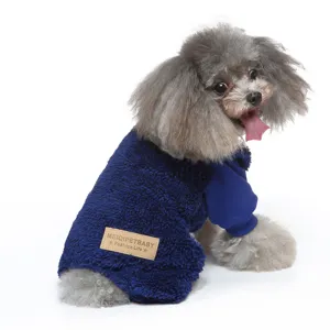 Cozy blue fleece dog jumpsuit with high collar and stylish leather tag detail for winter pets.