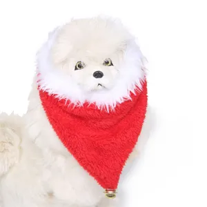 Close-up of fluffy red pet Christmas scarf featuring a small golden bell at the tip