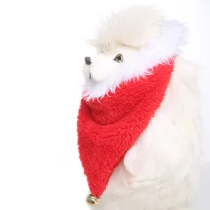 Close-up of red plush pet Christmas bandana with white fur trim and bell