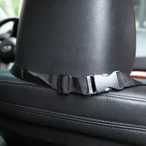 Pet car seat cover strap detail, black durable nylon adjustable buckle for secure installation.