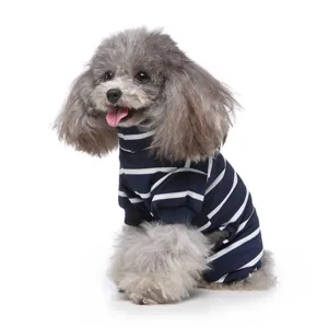 Navy blue striped pet jumpsuit detail view, cute dog wearing warm four-legged sleepwear.