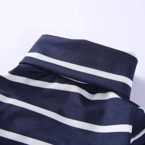 Detailed view of blue and white striped pet turtleneck sweater, cozy pet winter clothing.