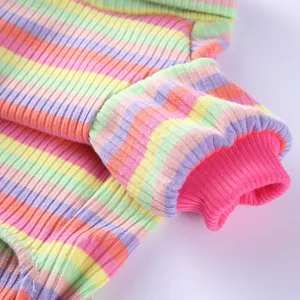 Detailed view of pastel striped pet dog pajamas, cozy ribbed fabric with pink cuffs.
