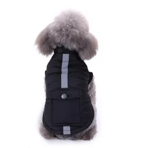 Close-up of black pet winter vest with reflective stripe and back pocket for small dogs.