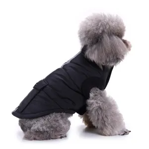 Side detail view of a black winter pet jacket for small dogs, featuring quilted warmth and pocket.