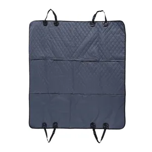 Waterproof dog car seat cover detail showing quilted grey fabric and durable mounting straps.