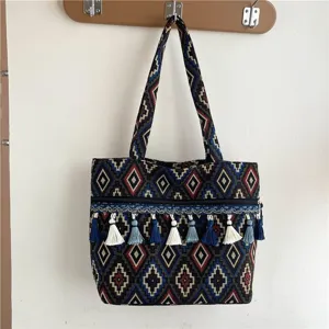 Bolso de hombro tejido de estilo étnico con borlas de colores