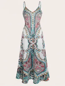 Close-up detail of the elegant vintage boho paisley print long dress with strap design.