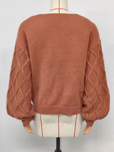 Chic womens knit sweater with lantern sleeves and stylish cable knit texture for autumn winter.