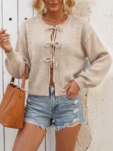 Women's solid color round neck tie-front knit cardigan, casual long sleeve sweater top.