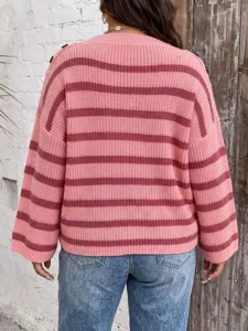 Back view of pink and burgundy striped knitted sweater featuring button details on shoulders