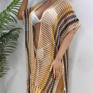 Bohemian striped crochet beach cover-up with fringe detail and open front design.