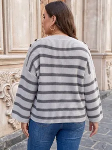 Back view of a plus-size women's striped sweater with decorative shoulder buttons