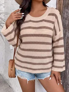 Close-up detail of women's striped knit sweater featuring elegant shoulder button accents