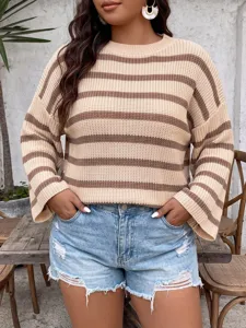 Close-up of plus size striped sweater with horizontal beige and brown patterns