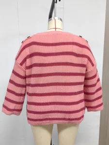Detailed back view of pink and burgundy striped knit sweater with shoulder button decor