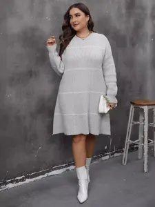 Plus size women's grey knitted sweater dress with white grid pattern and crew neck