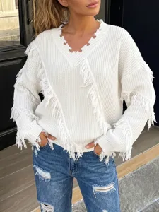 Detailed view of oversized V-neck fringe knit sweater, casual long sleeve pullover top.