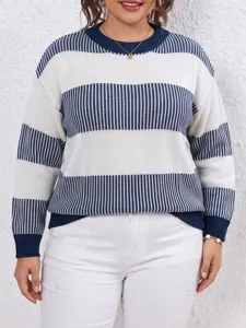 Detailed view of plus-size blue and white striped knit sweater, cozy and casual everyday style.