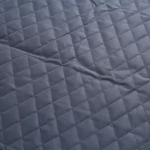 Close-up detail of the grey waterproof pet car seat cover fabric showing durable stitching.