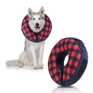 Inflatable dog recovery collar in red and black buffalo plaid pattern, comfortable pet cone.