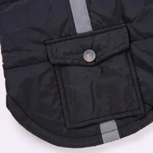Black winter dog coat detail featuring quilted warm fabric, practical pocket and reflective stripe.